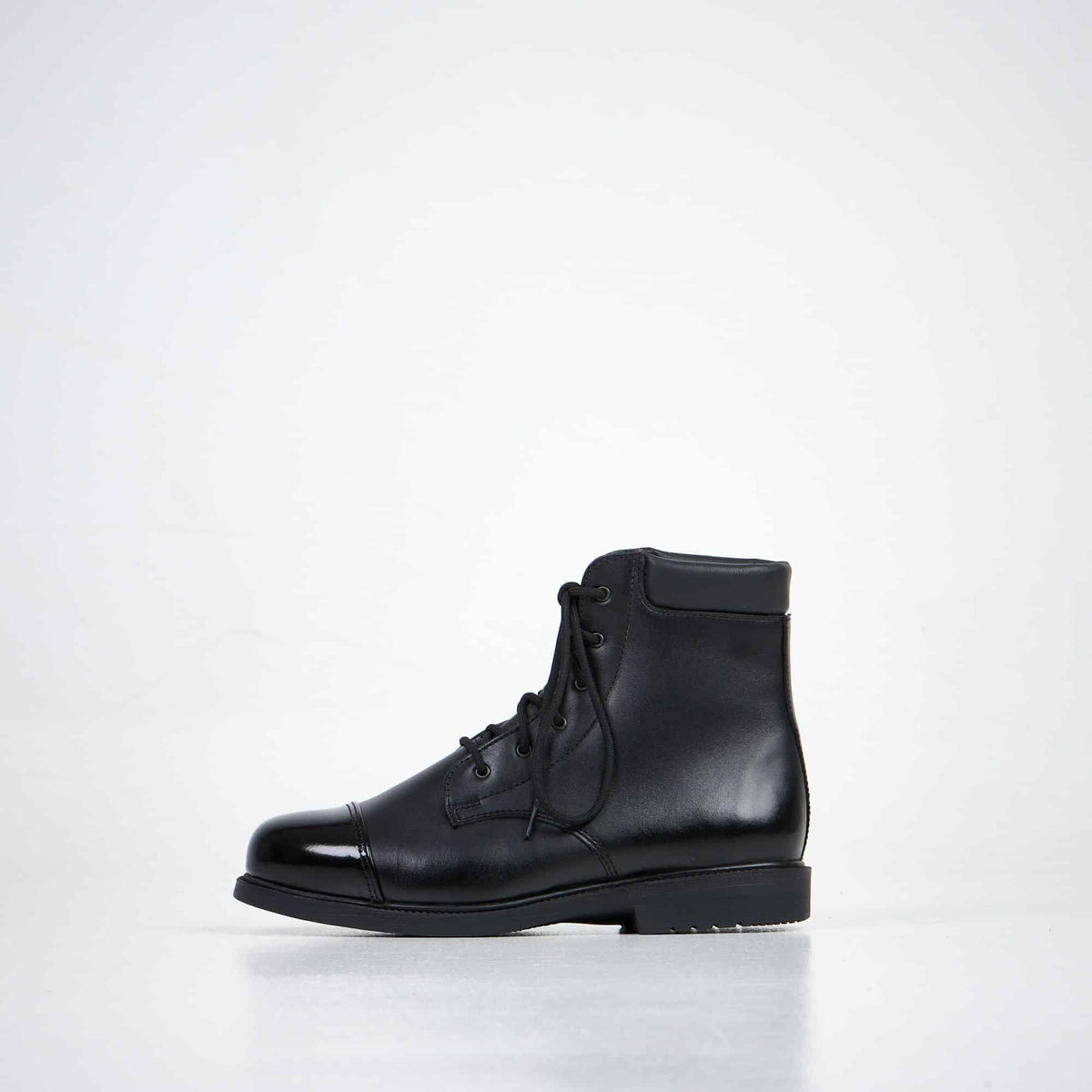 Leather boots showing the heel and ankle areas where rubbing can cause blisters
