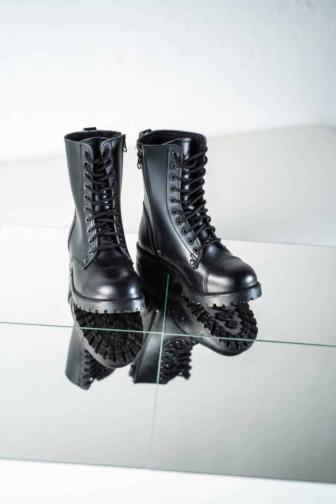 Winter boot showing insulation, waterproof construction and a lugged rubber outsole