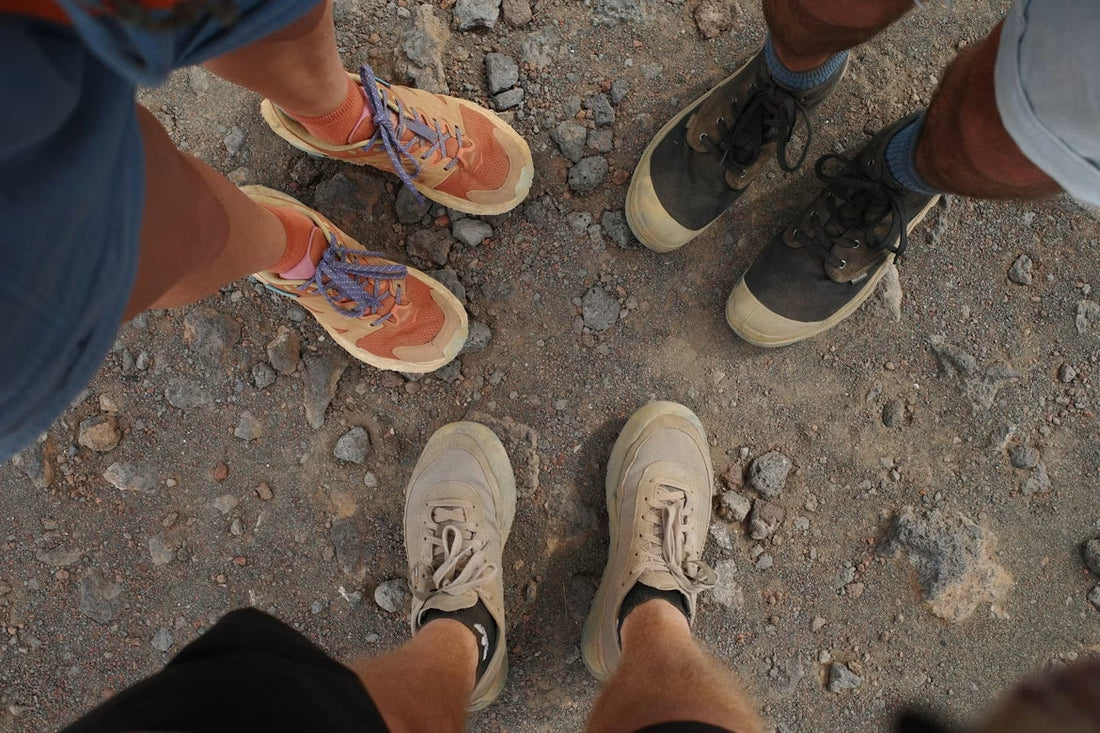 Hiking boots and hiking shoes compared side by side on a trail