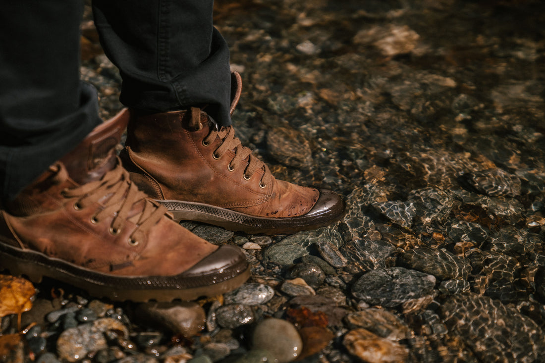 Hiking boots being checked for fit before stretching