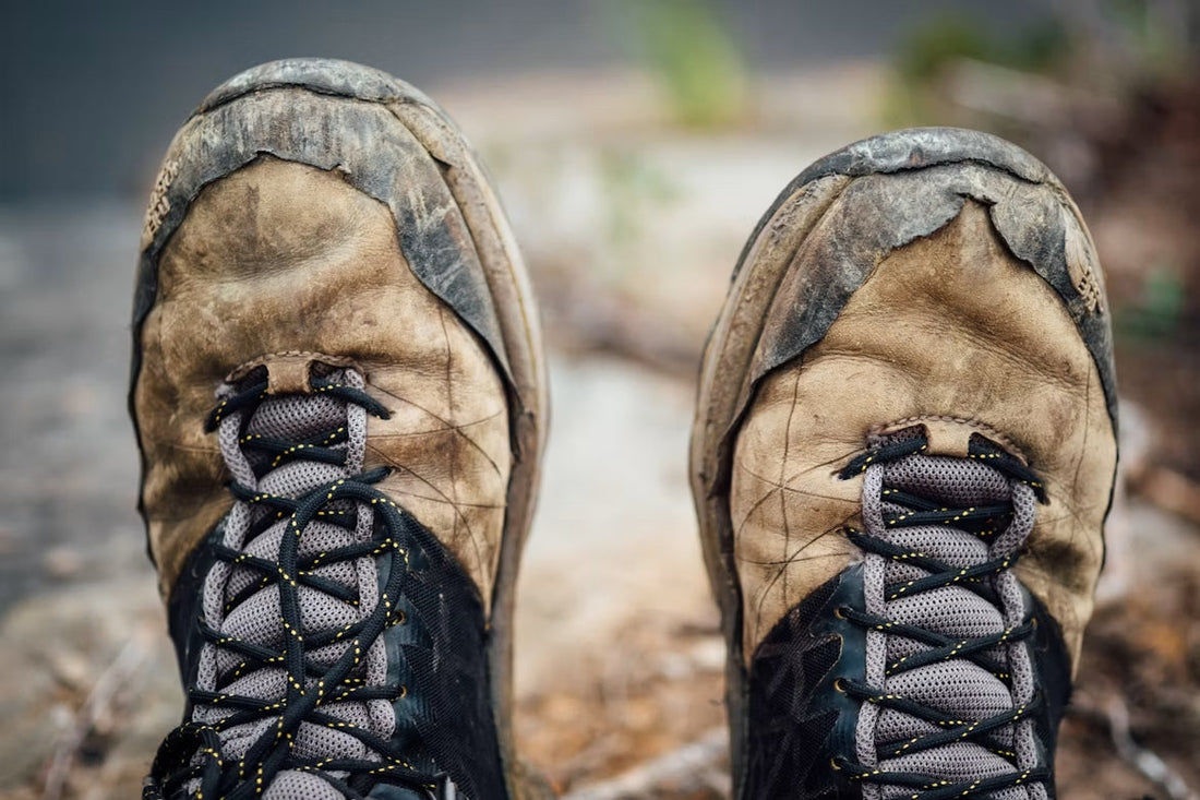 Repairing worn hiking boots with adhesive and boot repair tools