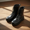 749402100 Botas de piel con suela Vibram